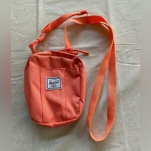 Dusty pink Herschel crossbody salmon colored